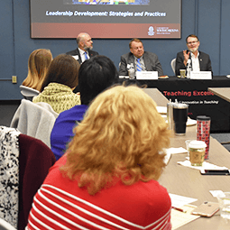 faculty attending a workshop presentation