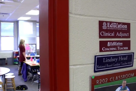 a view of a classroom from outside the door.