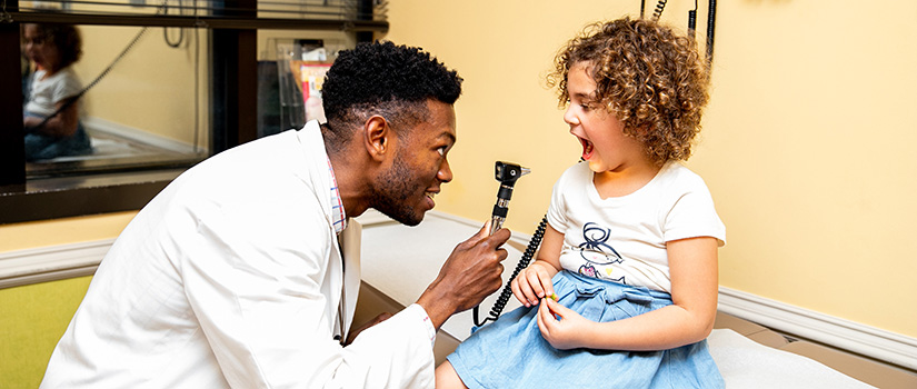 Medical student attending to a patient
