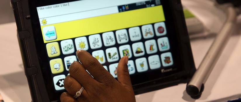 Hand using a tablet.